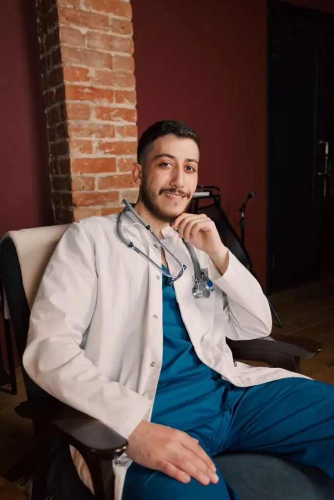 smiling male doctor in modern clinic setting